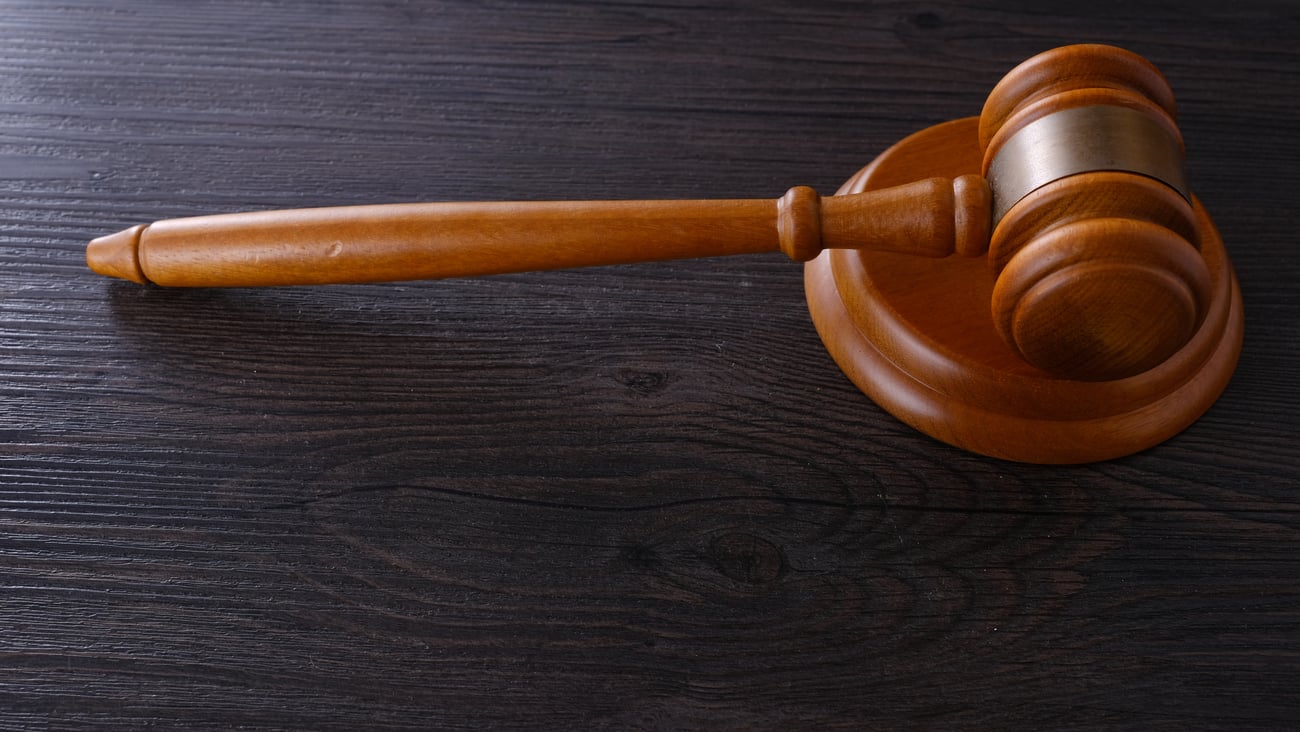a hammer on a wooden table