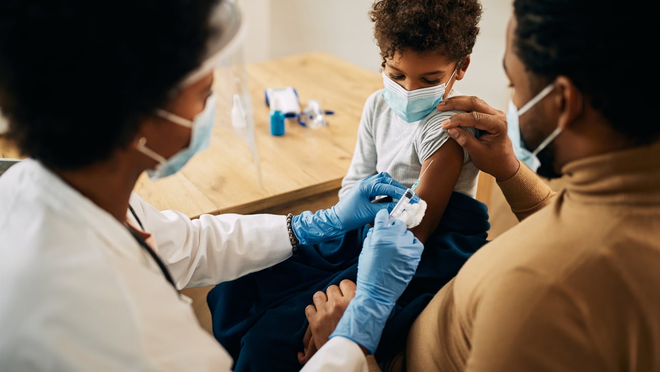 child getting vaccine