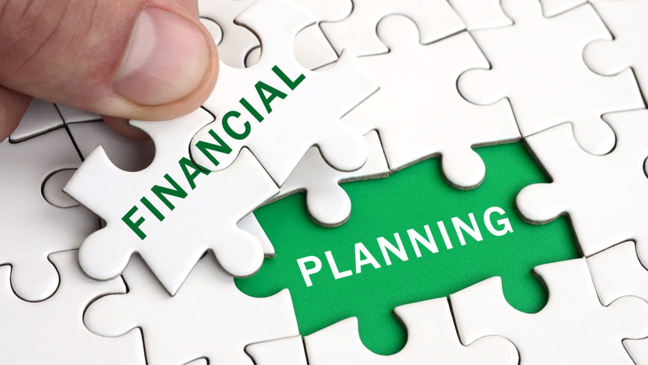 financial planning spelled out in puzzle pieces