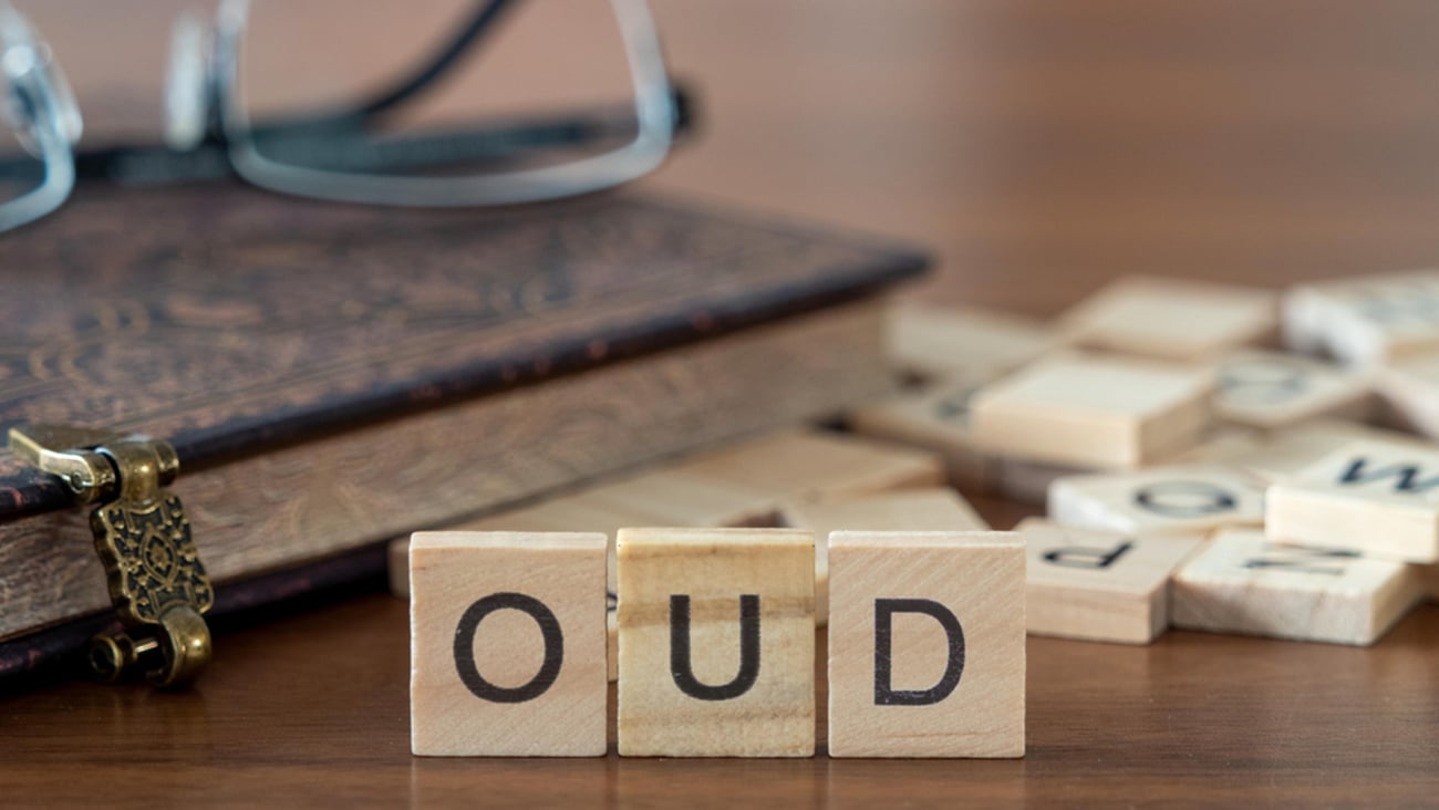 OUD spelled in scrabble tiles