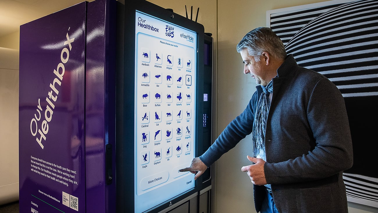 Man using a vending machine