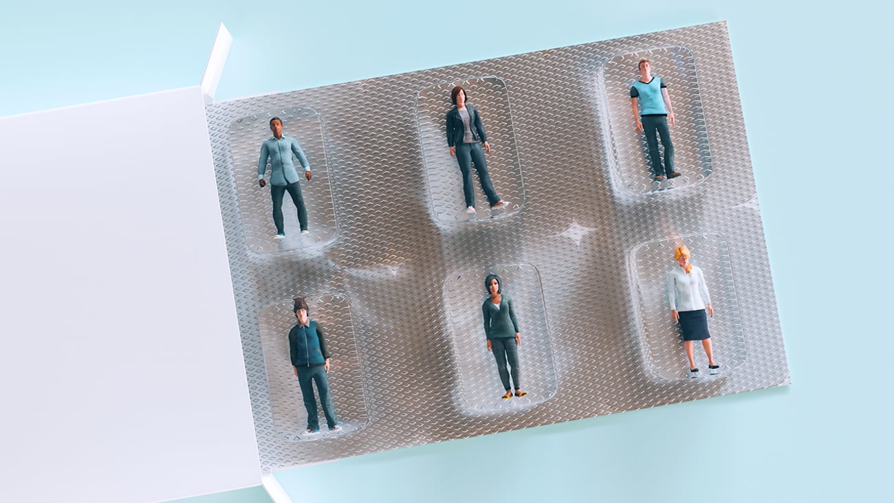 Tiny people inside a pill pack