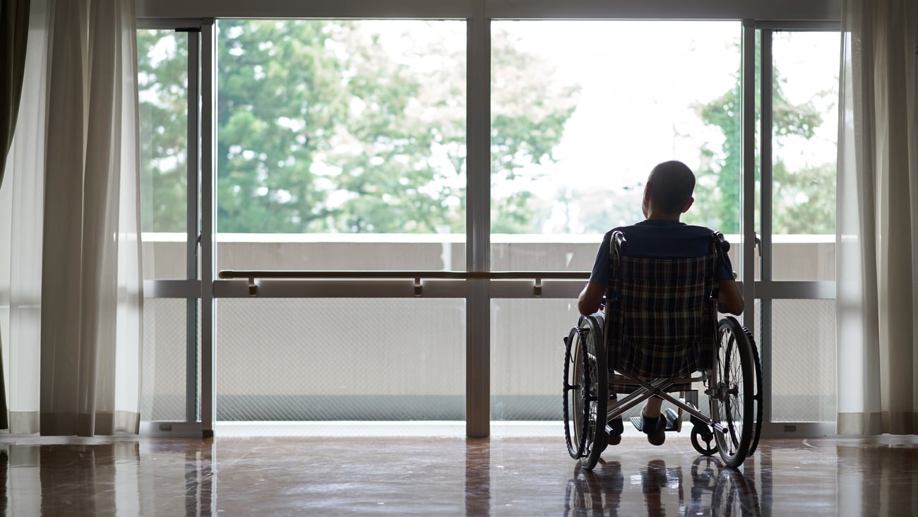 An elderly person in a wheelchair