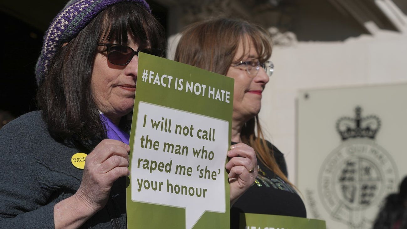 Woman with poster