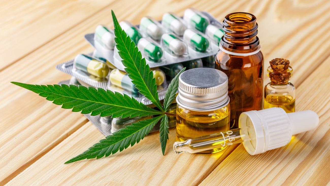 cannabis leaf, tincture, oil and dropper