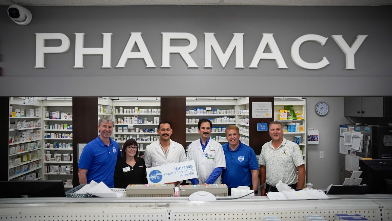 Premier Tim Houston and the Honourable Scott Armstrong with the Guardian Pharmacy team in Stewiacke, NS