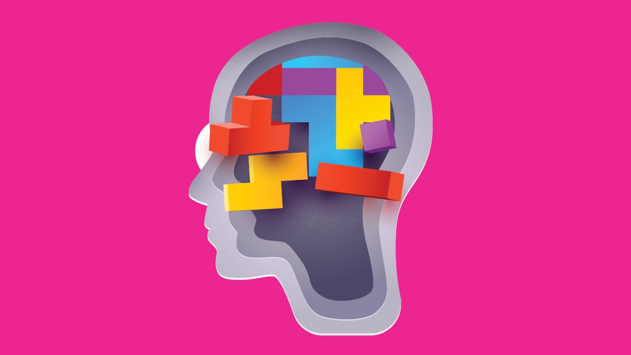 Brain with game pieces in it.