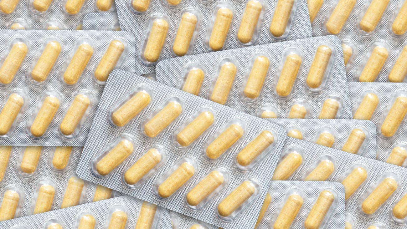 Packets of yellow pill capsules
