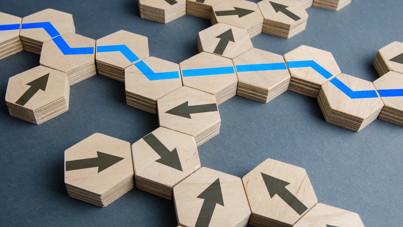 Puzzle pieces showing a blue path line
