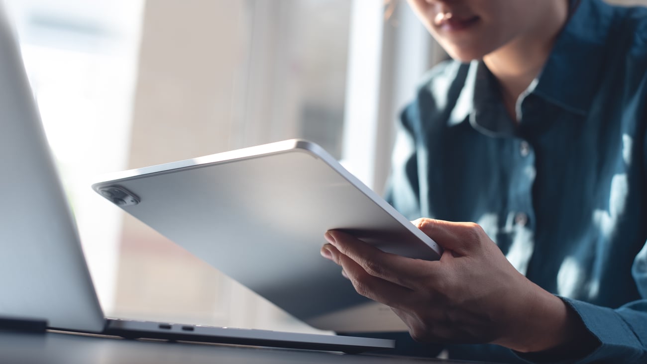 a young man working on his tablet
