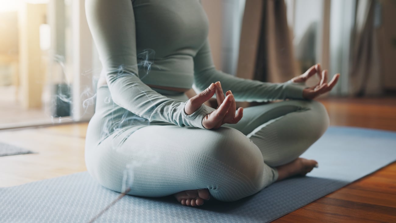 A woman practicing mindfulness meditation. 