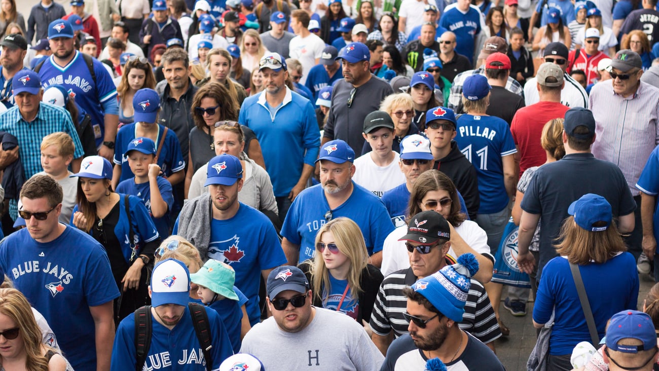 Crowd of fans in Downtown Toronto after baseball team Toronto Blue Jays beat the New York Yankees.