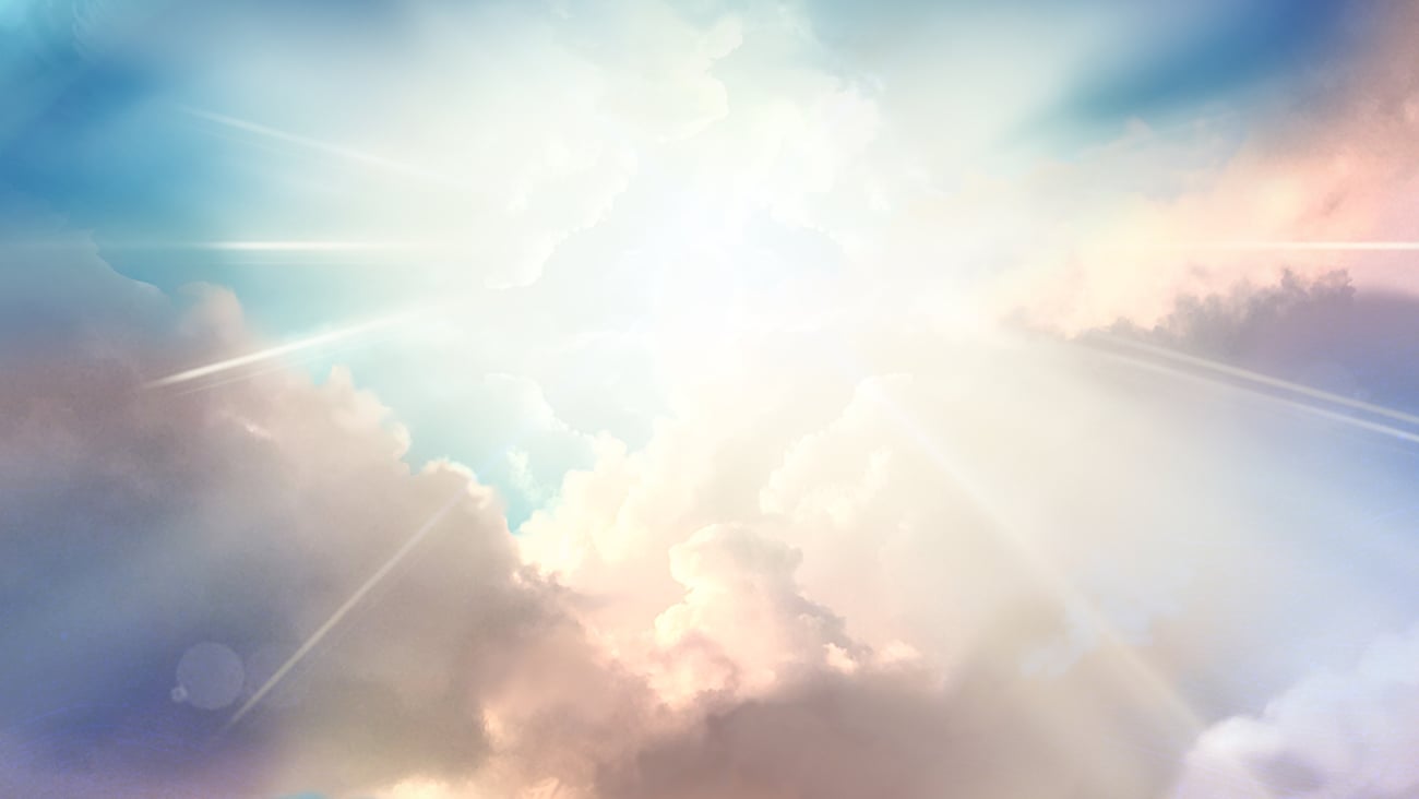 A view of the sky with celestial light shining down