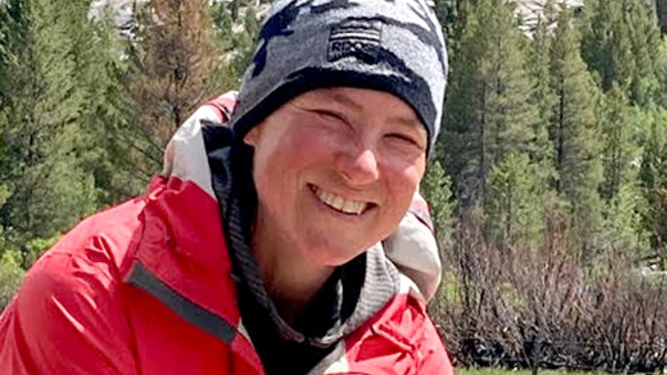 pharmacy technician Selena Gomez outdoors in a mountain setting