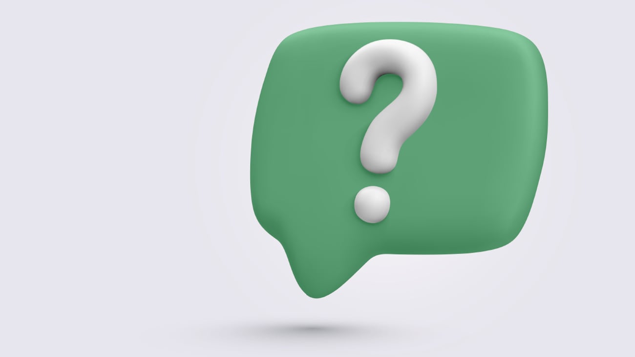 A big white question mark in the middle of a green speech bubble 