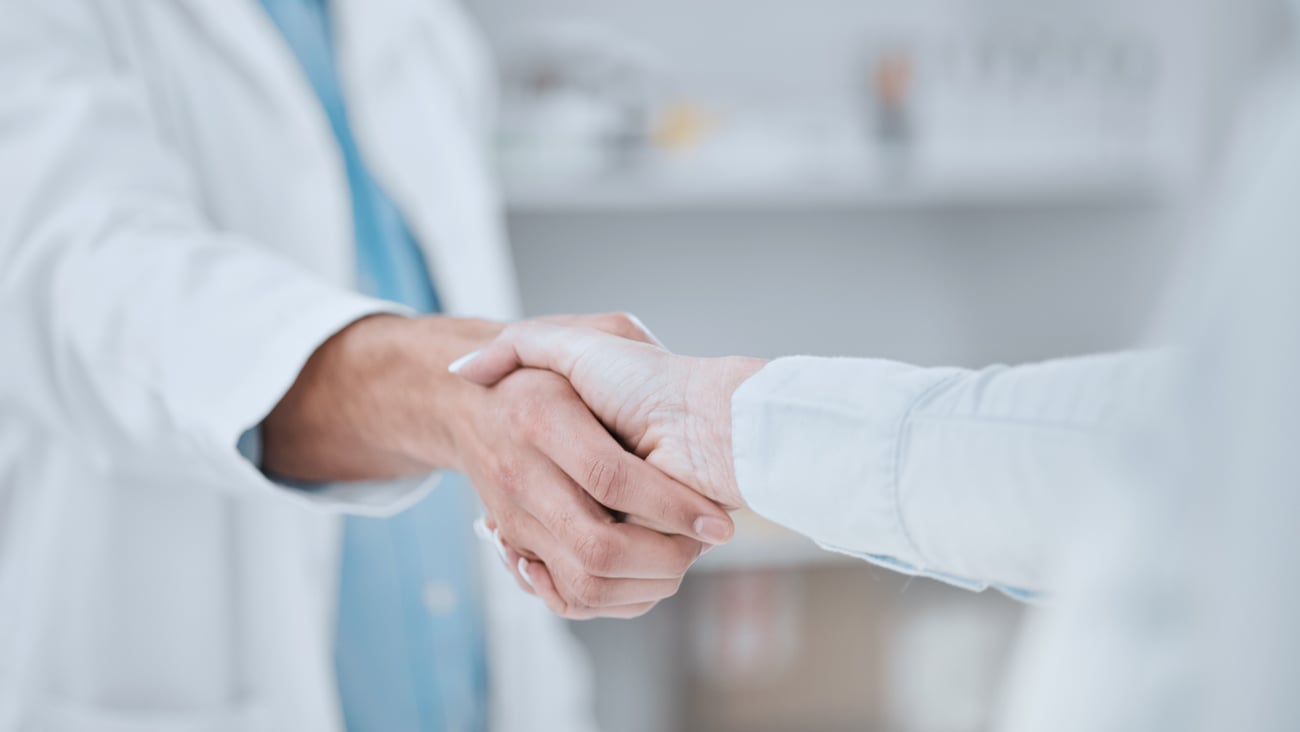 Pharmacists shaking hands