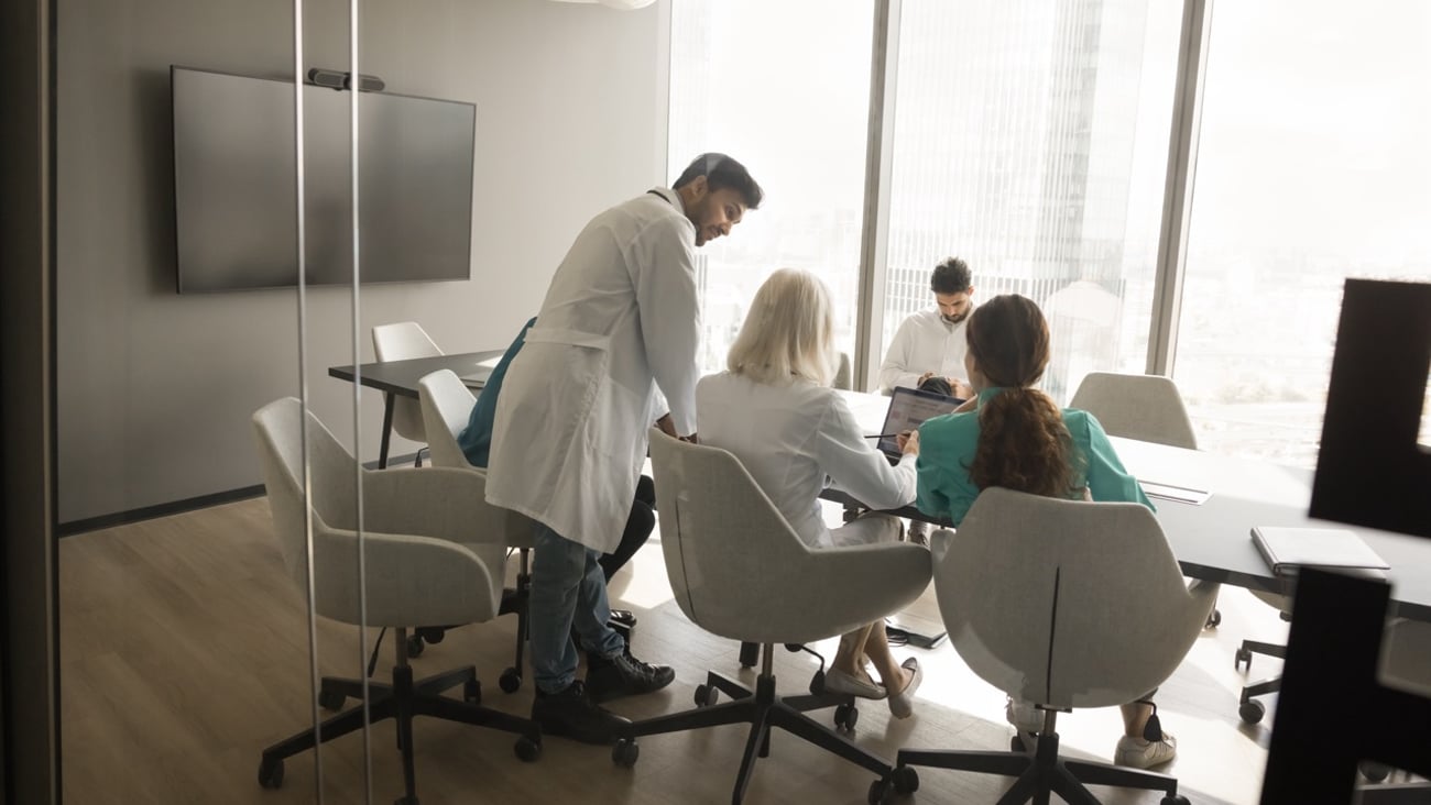 Doctors at a board meeting