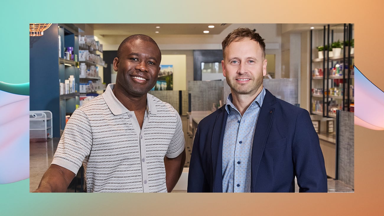 Two men standing together for a photo