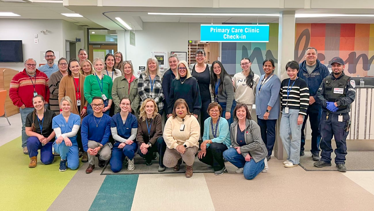 A group of healthcare workers posing for a photo