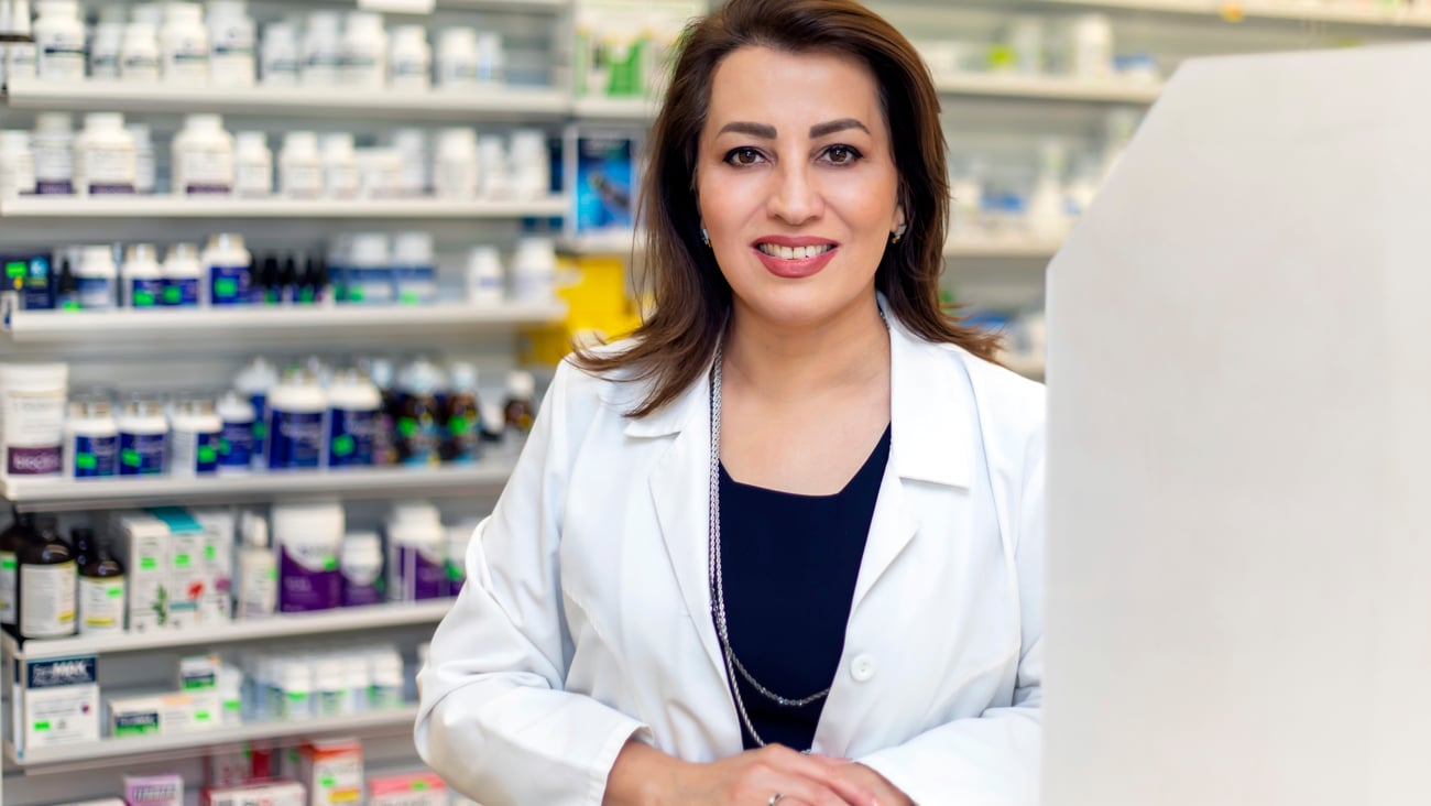 Sepideh Nasafat wide shot in her pharmacy