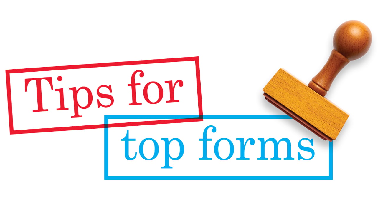 A stamp that just stamped text reading 'tips for top forms' 