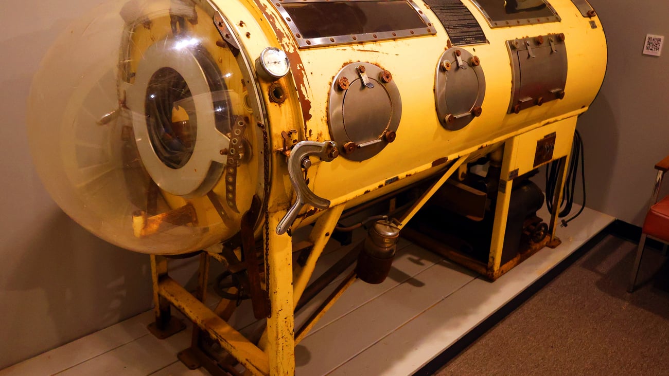 An iron lung machine in a museum