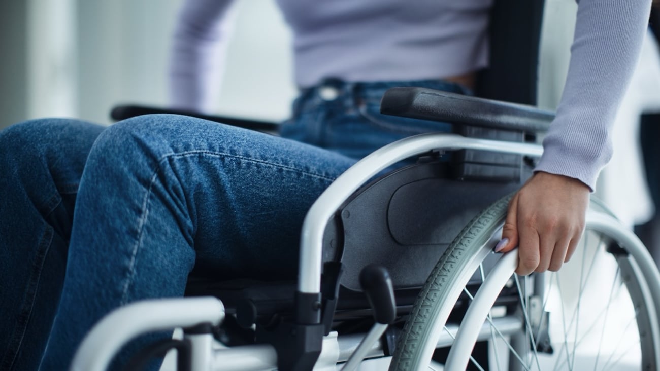 A person using a wheelchair.