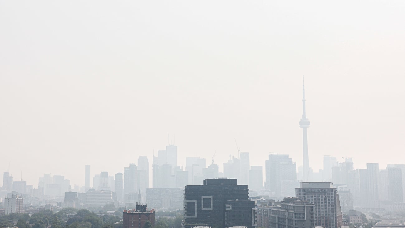 Smoke from wildfires cast haze over the Toronto skyline.