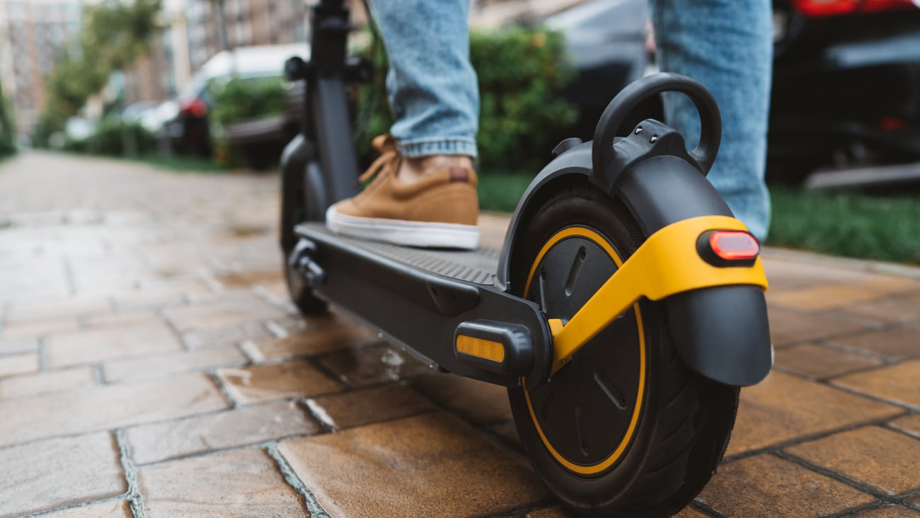 Close up of the back of an electronic scooter