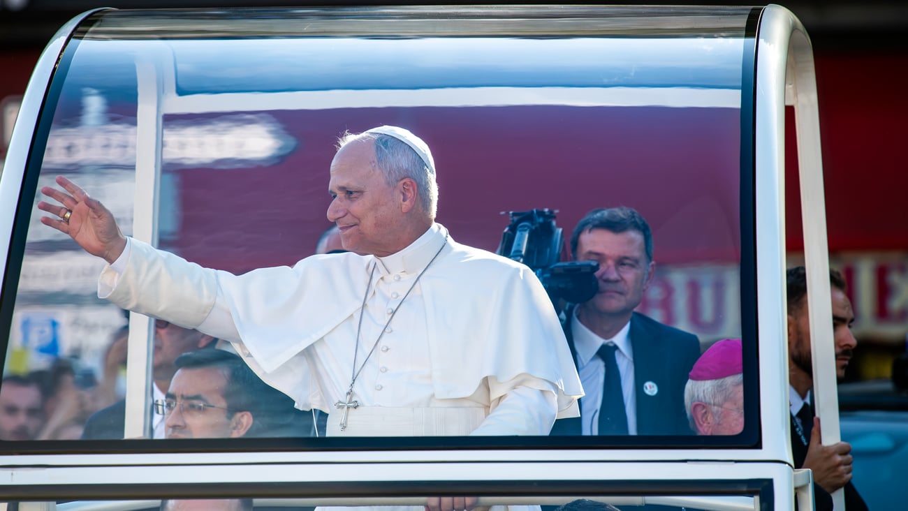 Pope Leo XIV waves crowds in Paris aboard the Popemobile on Sept. 25, 2026.