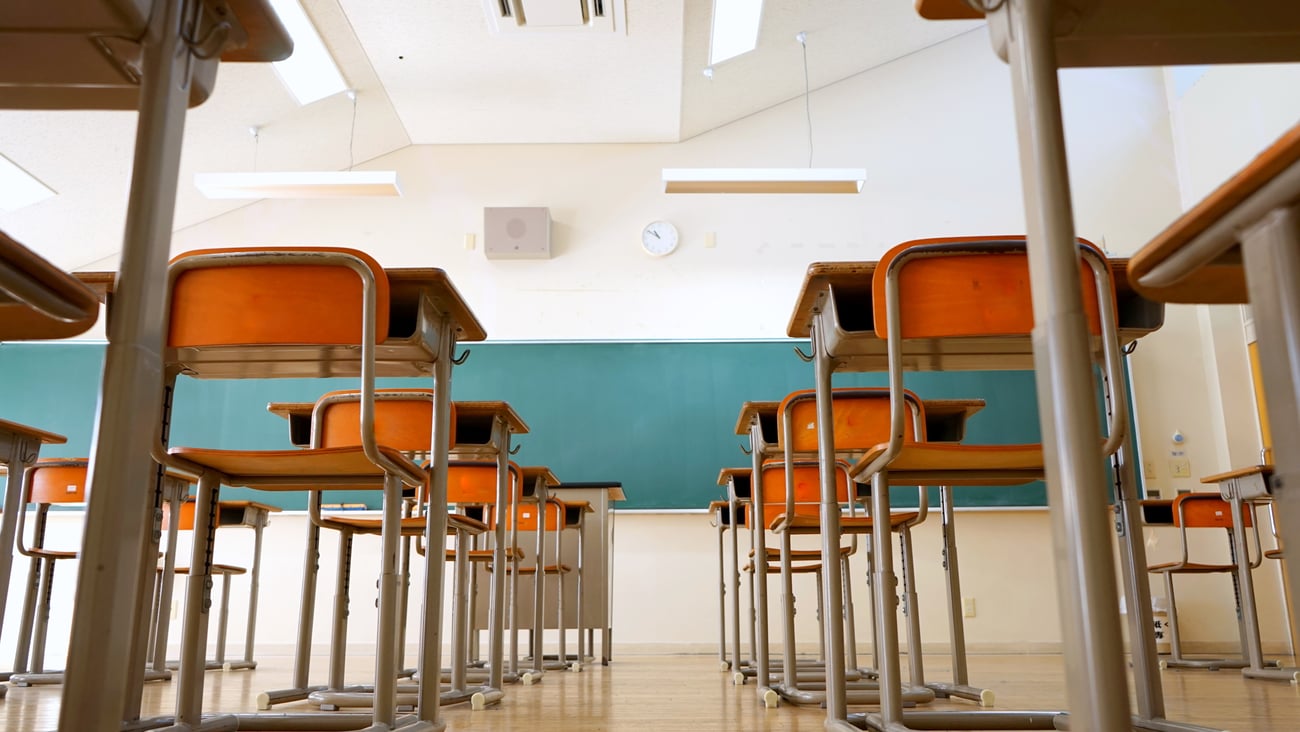 Rows of desks in a high school classroom