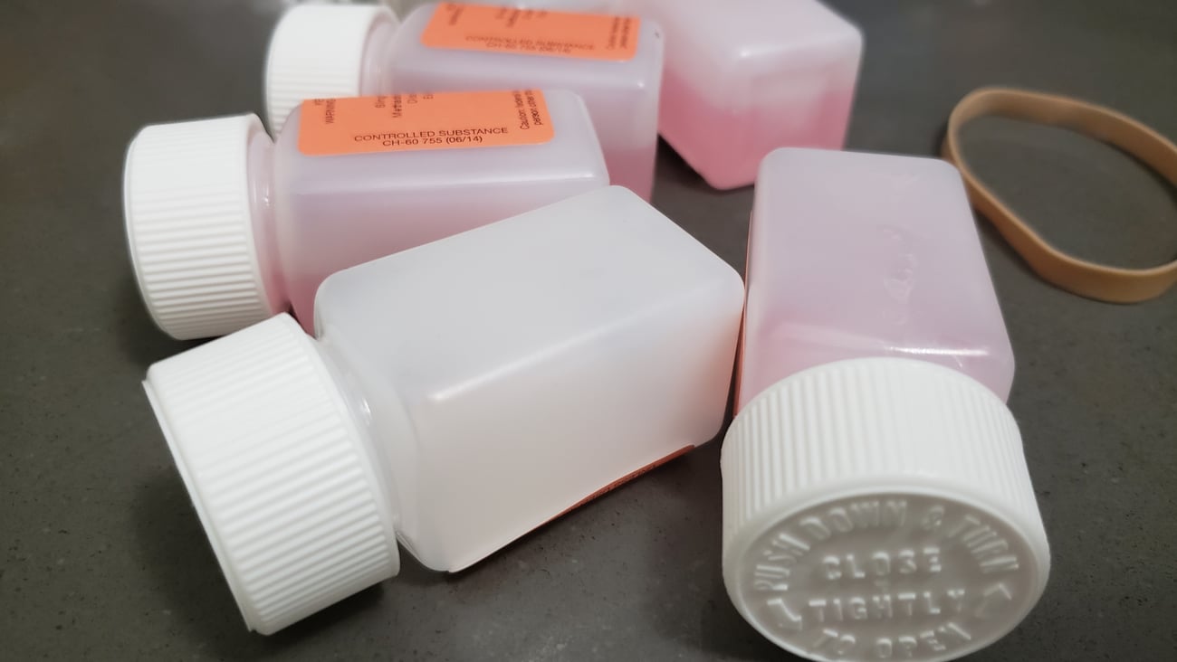 A pile of methadone bottles