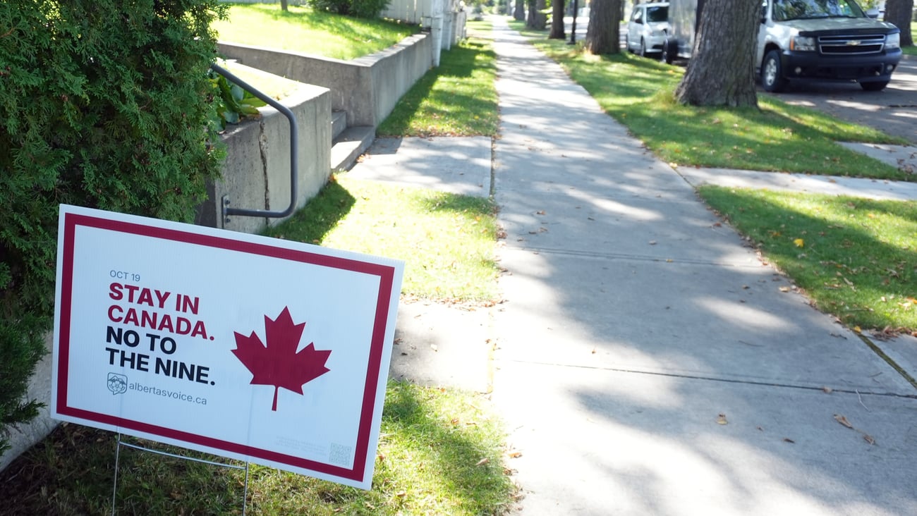 A lawn sign in Alberta ahead of the province's referendum, urging voters to stay in Canada and vote "no to the nine."
