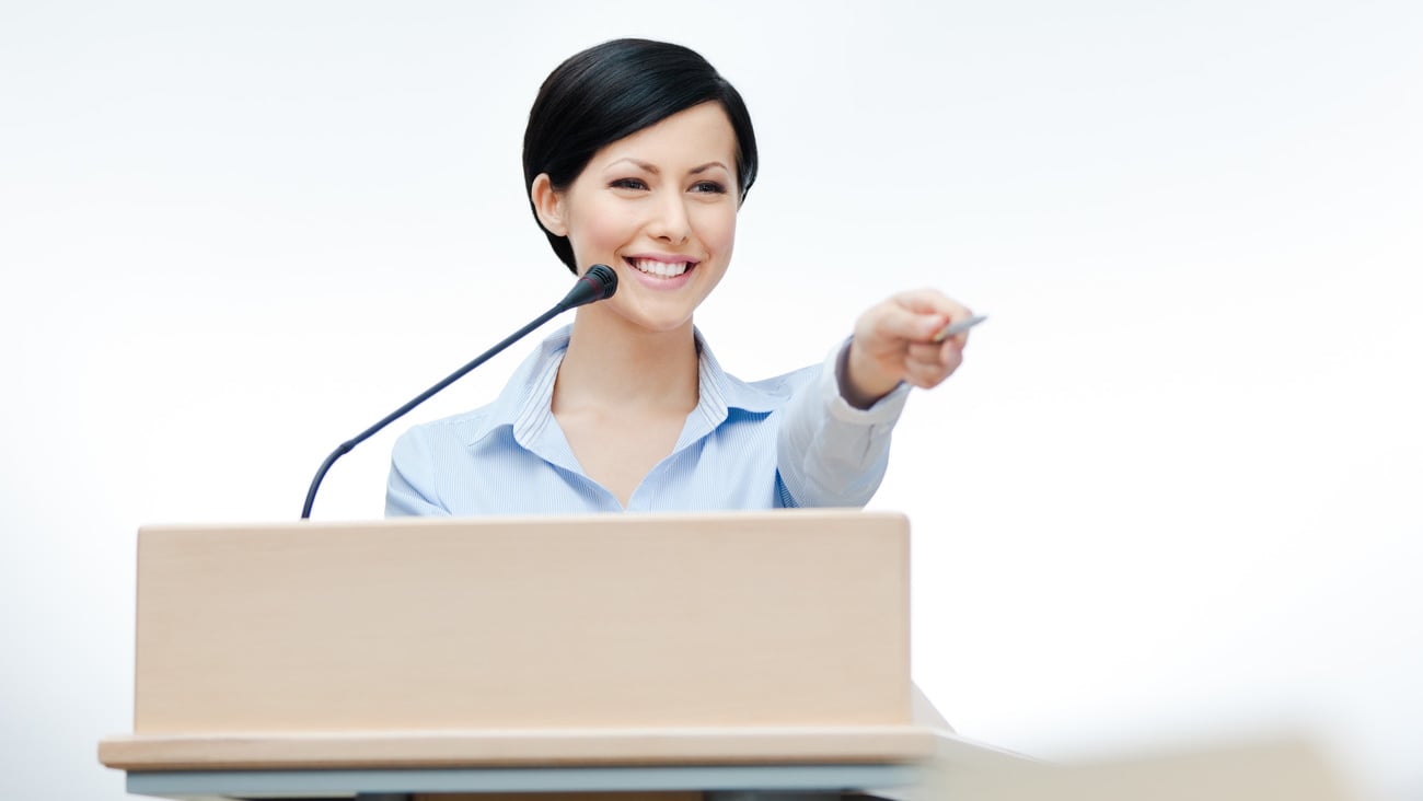 Female speaker at the board. Business conference; Shutterstock ID 112994893