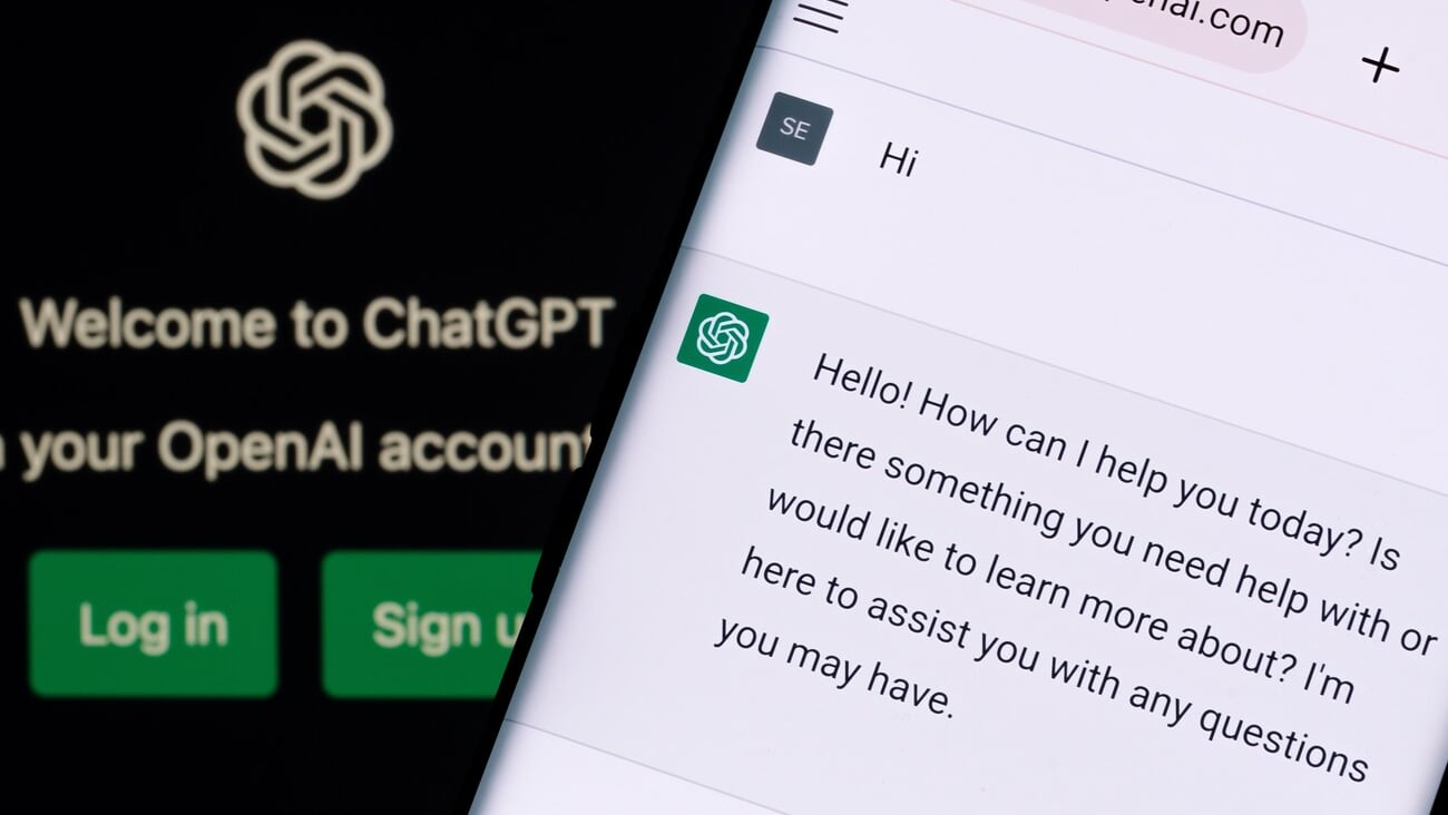 ChatGPT chat bot screen seen on smartphone and laptop display with Chat GPT login screen on the background. A new AI chatbot by OpenAI. Stafford, United Kingdom, December 13, 2022.; Shutterstock ID 2237752713