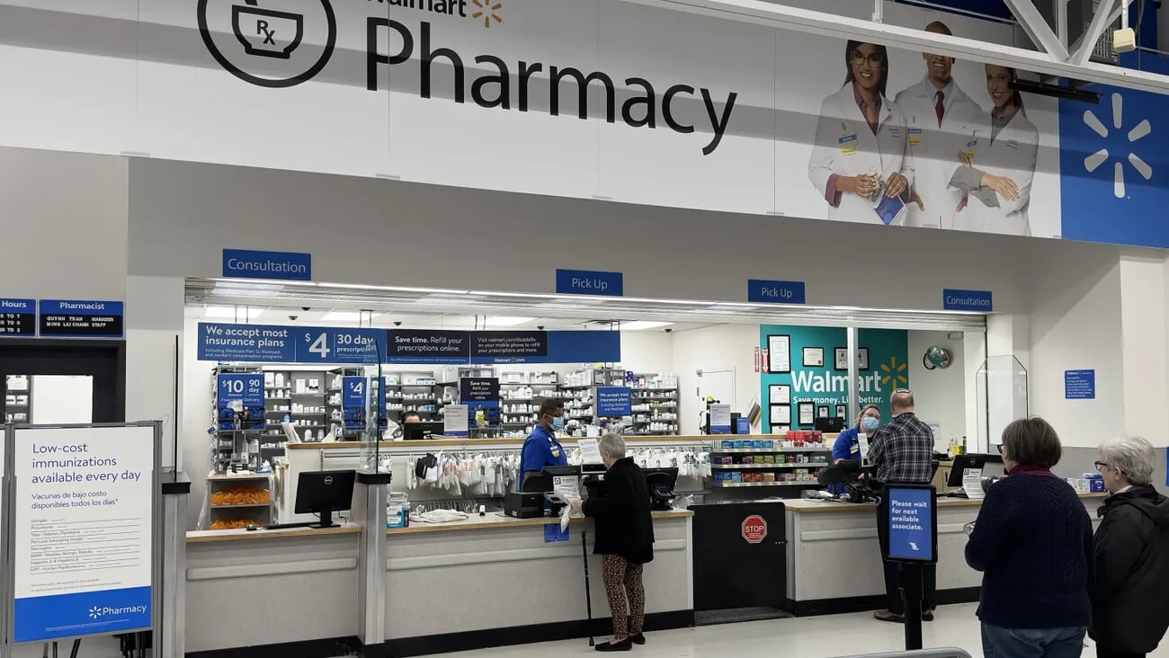 Walmart retail store Pharmacy serves waiting customers, Peabody Massachusetts USA, April 19 2023; Shutterstock ID 2291752415