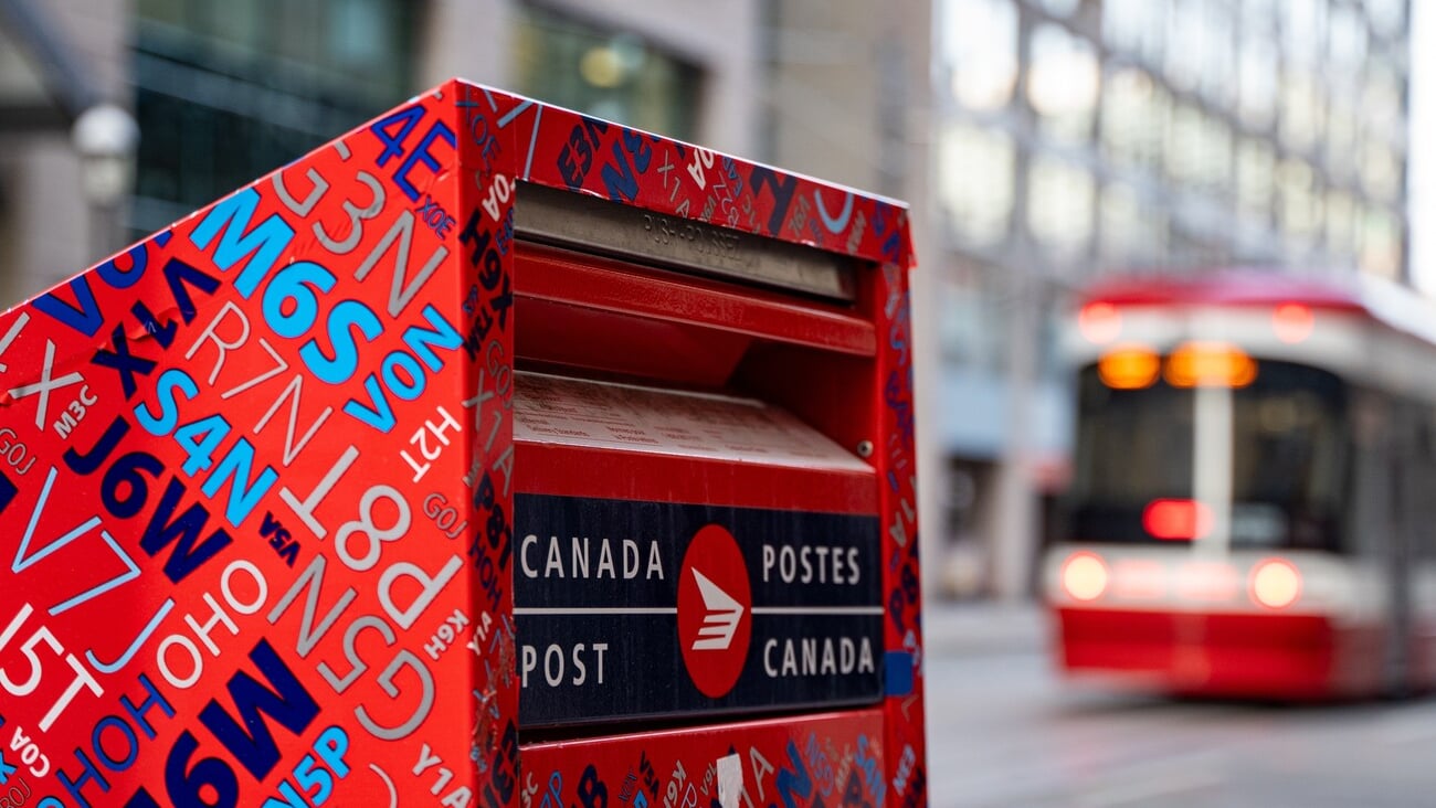 Canada Post box in Downtown Toronto. Canada Post Corporation is a Crown corporation that functions as the primary postal operator in Canada. Toronto, Canada - April 29, 2024.; Shutterstock ID 2456963039
