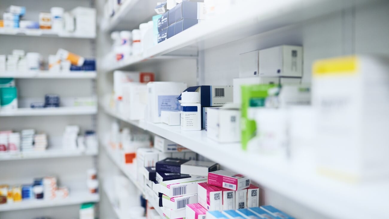 Pharmacy, medicine and box with healthcare store, shelf and prescription care pills. Medical, retail shop and supply of health supplements, vitamins and minerals for vitality and wellness dispensary; Shutterstock ID 2488685663