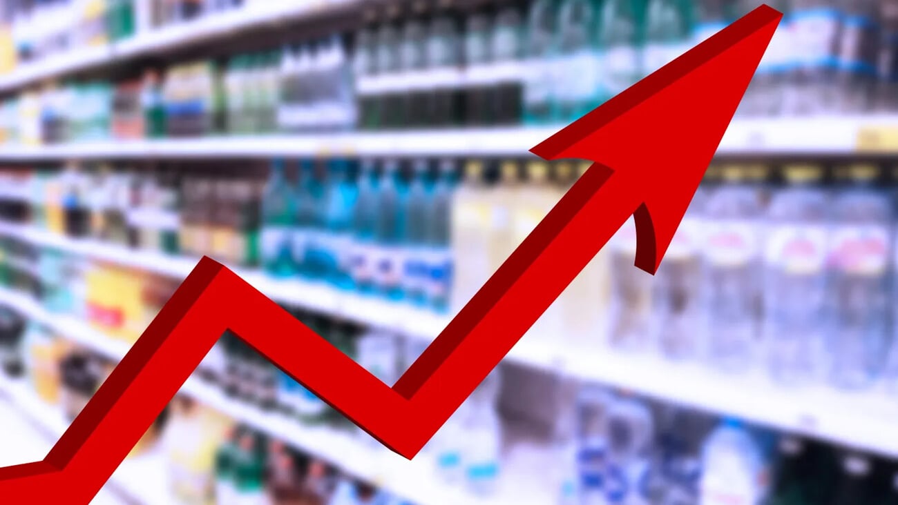 Red growing up big arrow on blur supermarket background. Bar charts and graphs. Rising prices. Inflation concept. Retail industry. Finance and Economy. Stock Market. Store. Tax. Food and Drink. CPG.; Shutterstock ID 2505457763