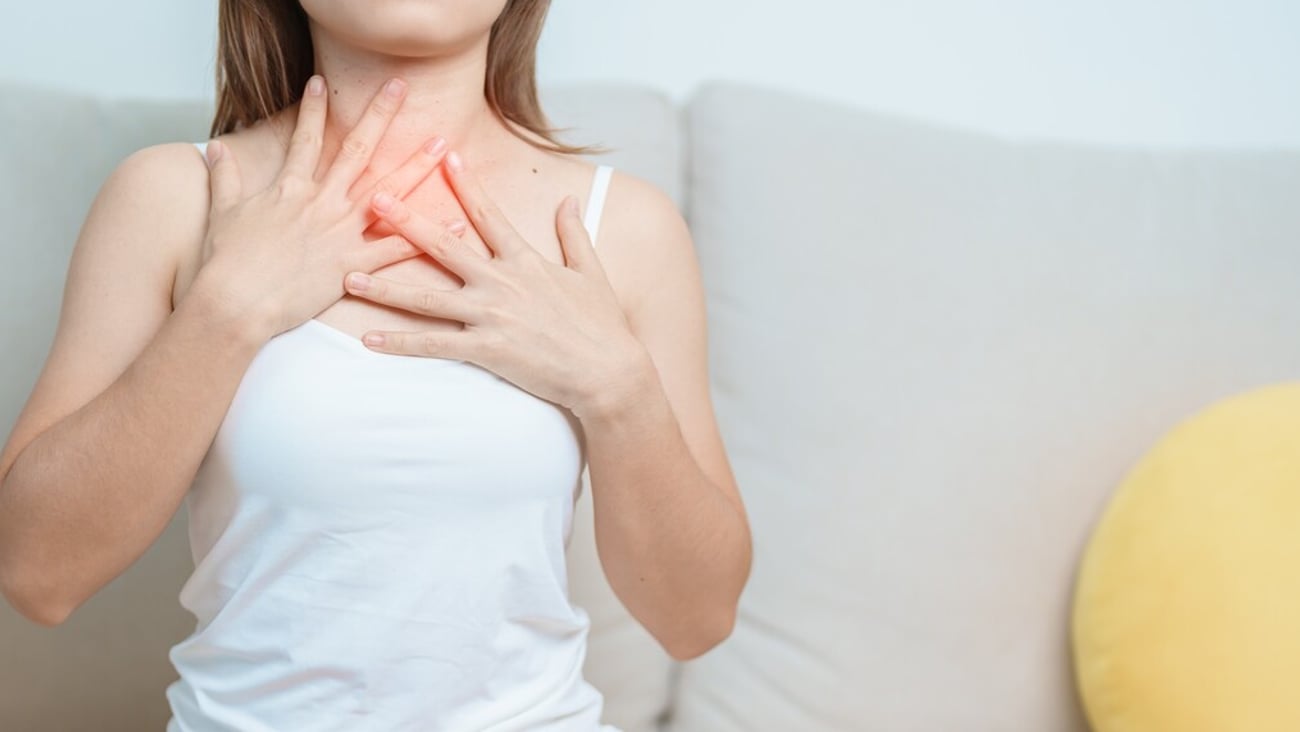 Gastroesophageal Reflux Disease or GERD, Acid reflux disease, Gastro Oesophageal or GORD and Dyspepsia concept. woman having Stomach ache and Esophageal pain due to Digestion system problem; Shutterstock ID 2530607793