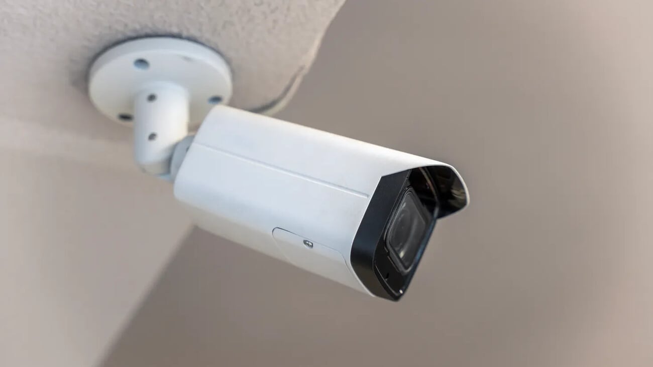 Ceiling-mounted indoor CCTV camera. Security system; Shutterstock ID 2735771445