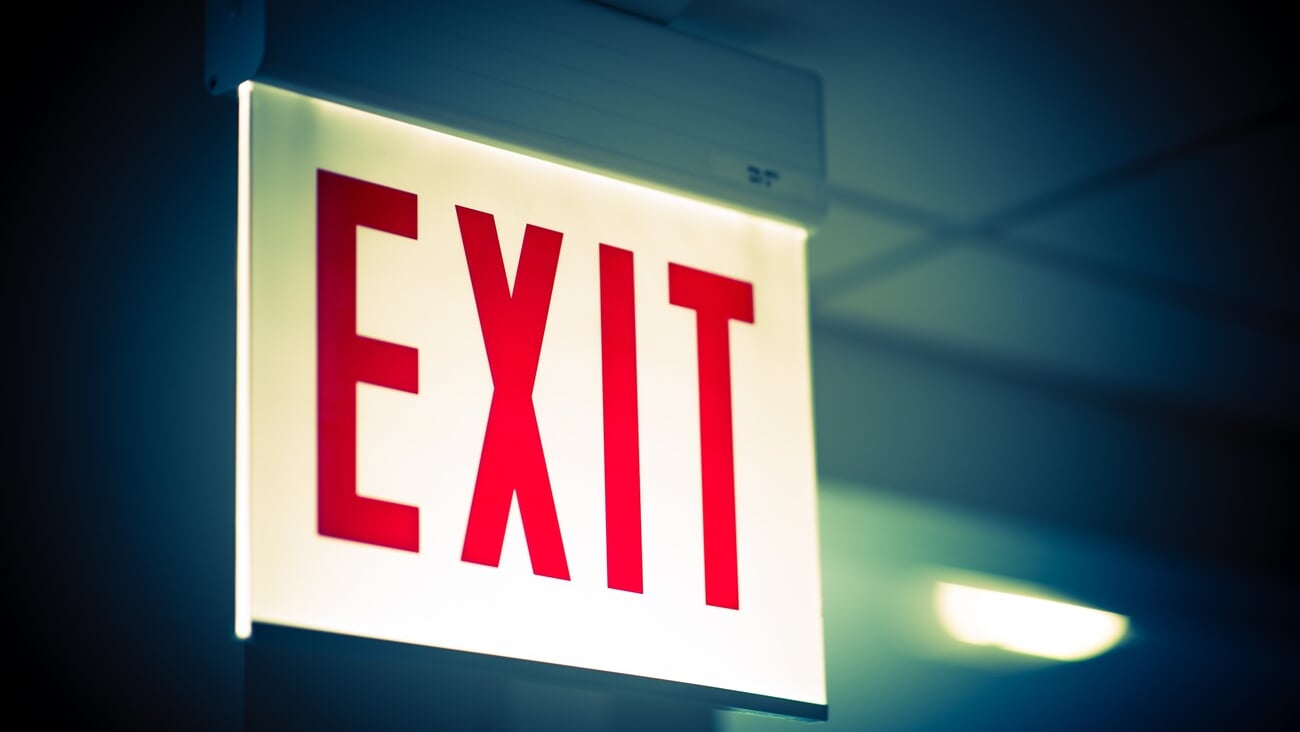 Illuminated Corporate Office Exit Sign Closeup.; Shutterstock ID 290597015