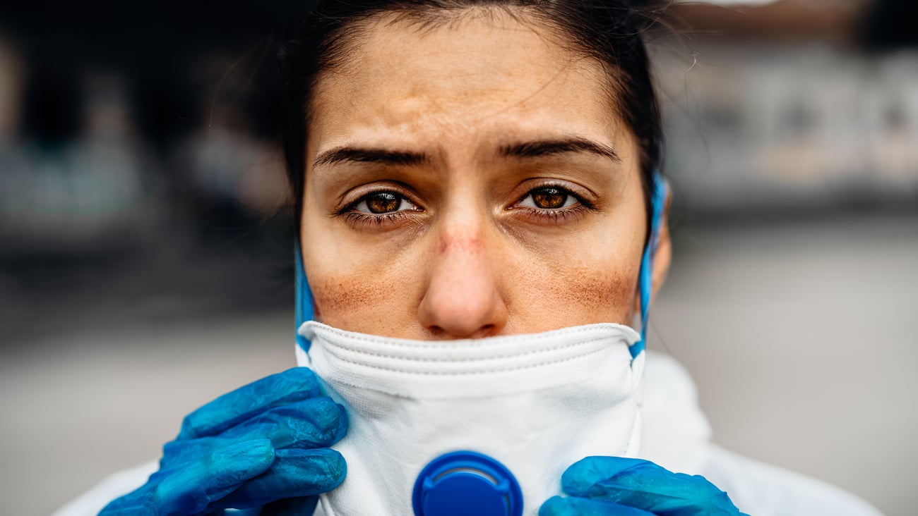 Stressed EastIndian healthare worker shutterstock 