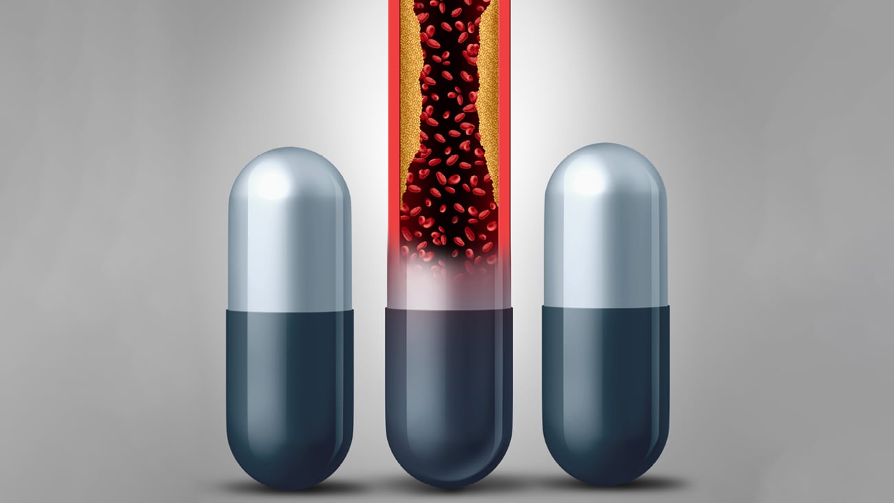 Cartoon of pills with one meant to look like a vein