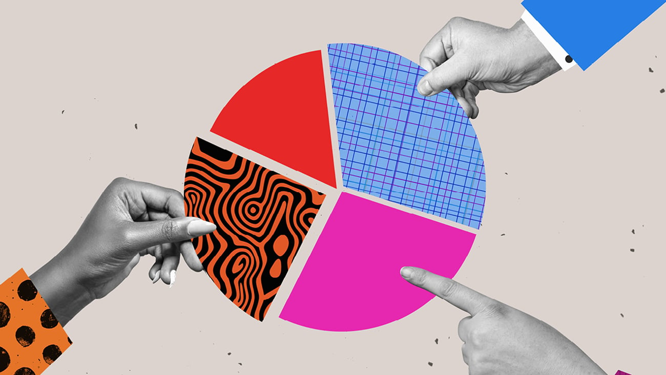 People putting together multicoloured sections of a pie chart