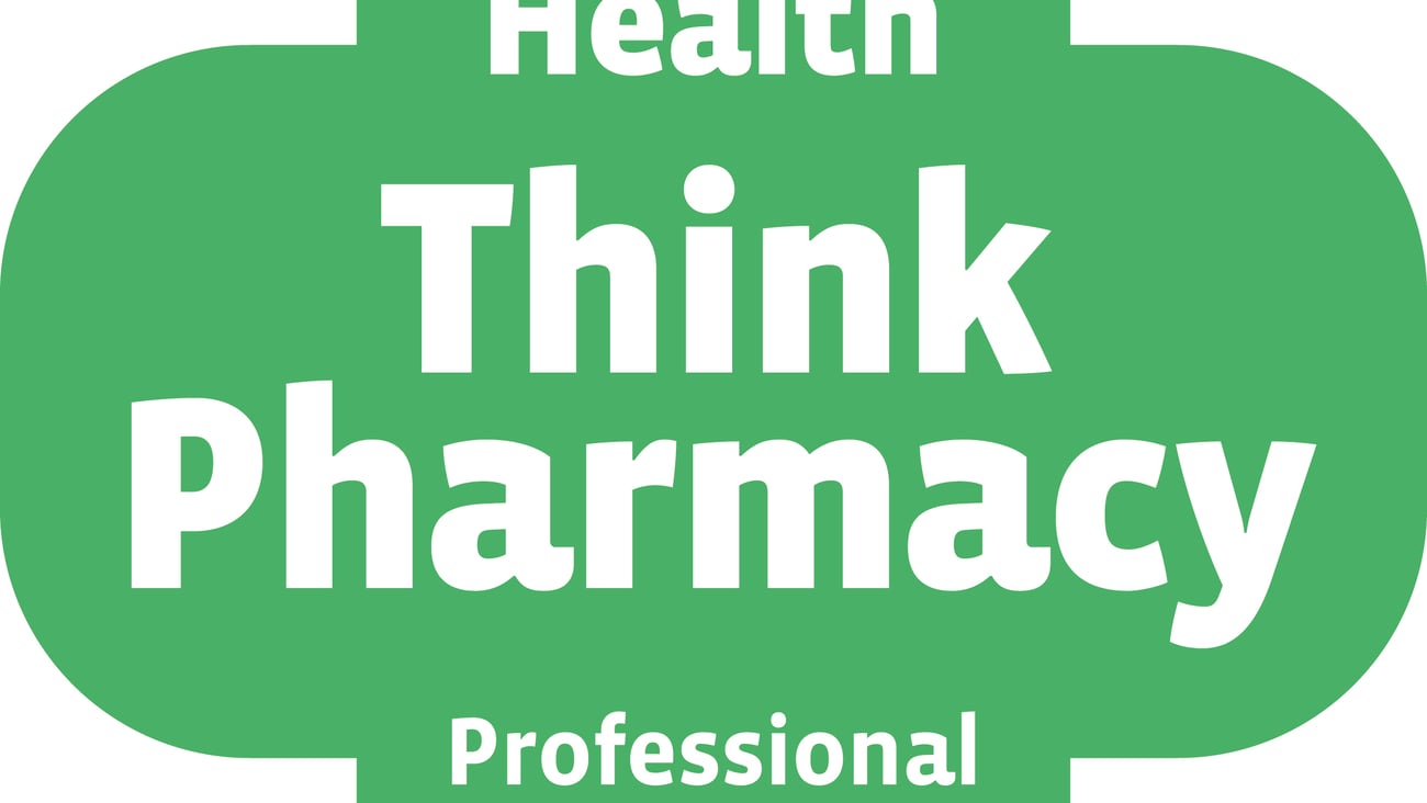 A green clover-shaped spot with “Think Health Think Pharmacy” on it