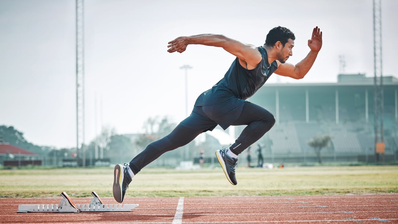 A track-and-field athlete is seen running.