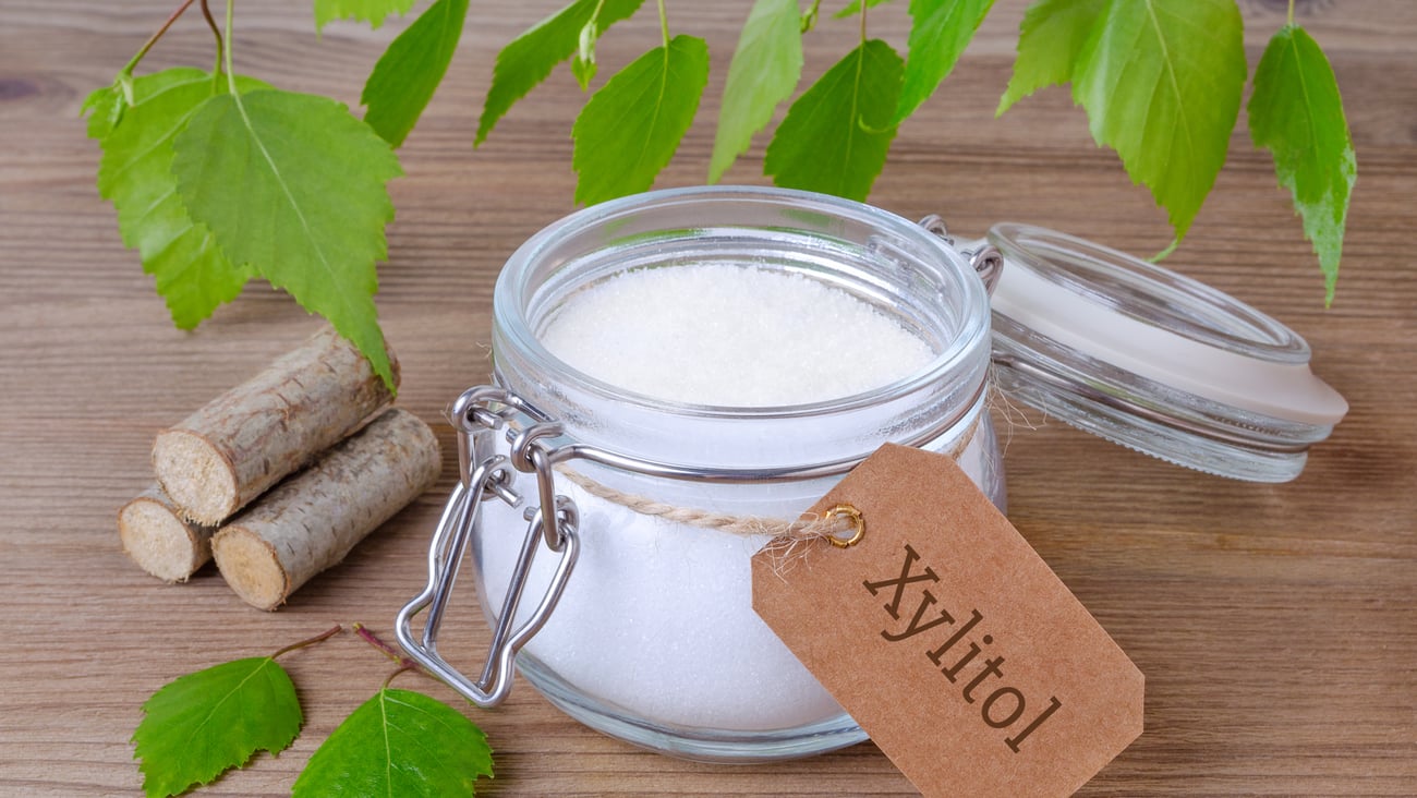 glass jar of white substance labelled xylitol