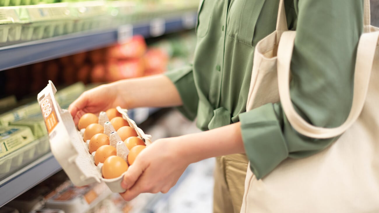 Girl at supermarket holding cotton shopper bag and buying eggs in craft package without plastic bags. Zero waste, plastic free concept. Sustainable lifestyle. Banner; Shutterstock ID 1508857769