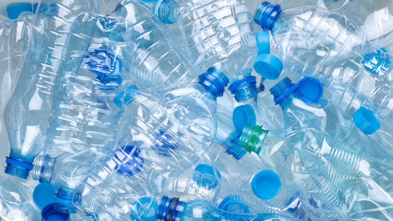 Plenty of plastic bottles on white background top view; Shutterstock ID 1684016206